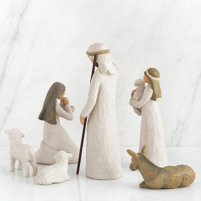 Six hand-painted resin figures; the tallest is 9.5"h. includes Mary, Joseph, the shepherd, the donkey, and two sheep.