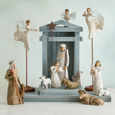 The angels, Mary and Joseph, the shepherd, the donkey, three sheep, an ox, and a calf are among the six hand-painted resin figures.