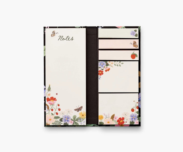 pad for making lists and sticky notes for flagging pages and posting reminders.