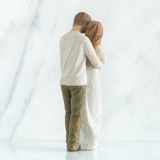 A romantic figure of two people, much in love, who have found their true partner in life
