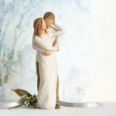 A romantic figure of two people, much in love, who have found their true partner in life
