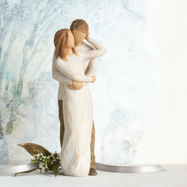 A romantic figure of two people, much in love, who have found their true partner in life