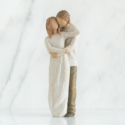 A romantic figure of two people, much in love, who have found their true partner in life