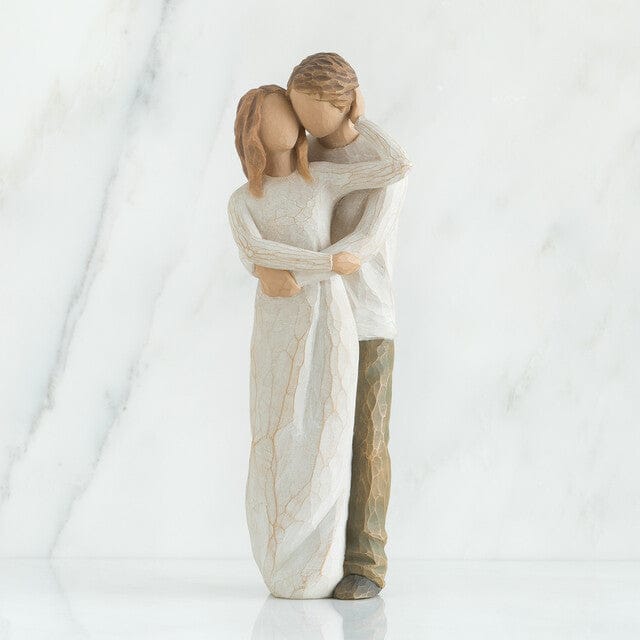 A romantic figure of two people, much in love, who have found their true partner in life